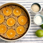 Baked oatmeal with oranges, sesame seeds, cacao nibs and ginger