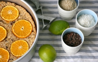 Baked oatmeal recipe with oranges sesame seeds and cacao nibs